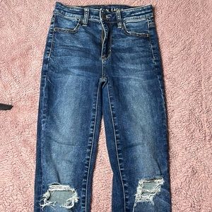 AEO NEXT LEVEL STRETCH RIPPED JEANS
